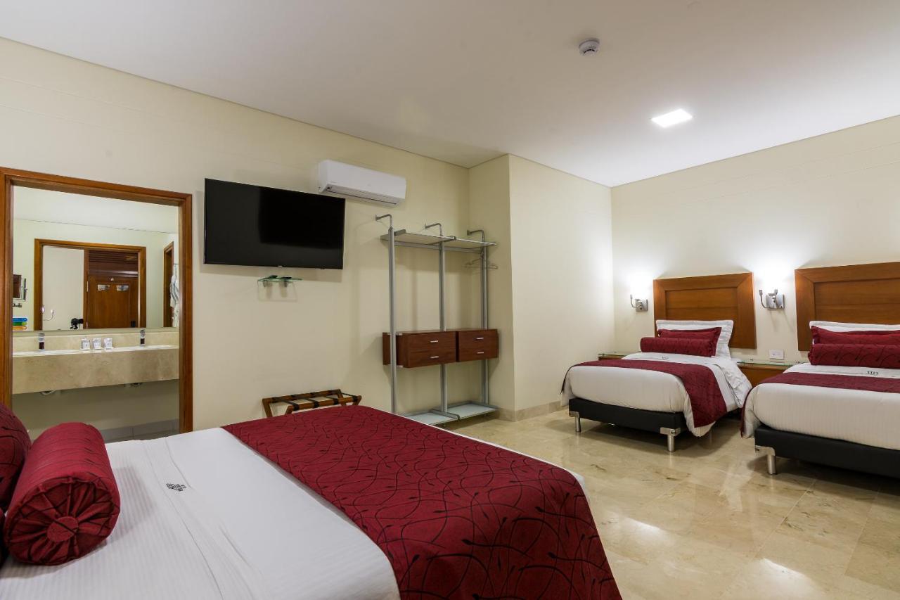 Hotel Dorado La 70 Medellin Bagian luar foto